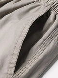 OTUSI Men's Solid Elastic Waist Cargo Pants Summer Cotton Pocket Work Wear Casual Climbing Joggers Sweatpants Hombre Autumn Trousers