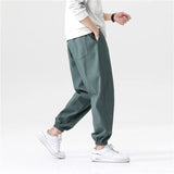 Man Sweatpants Spring Summer Oversize Casual Loose Nine Points Pants Sports Bunches Foot Joggers Pants Ice Silk Pants Baggy