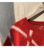 Otusi Diamond V-Neck Sweater