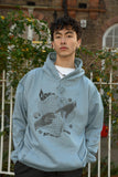 Otusi Hoodie in Dusty Blue with Sci Fi Rave Hands Print