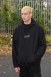 Otusi Hoodie in Black with DBDNS Futuristic Logo Embroidery