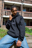 Otusi Hoodie in Black With Oval Logo Embroidery