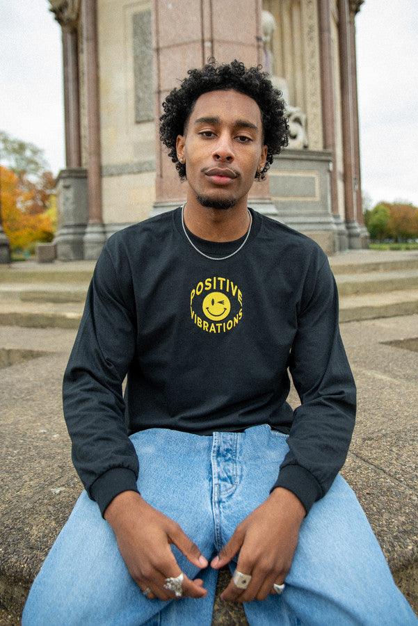 Otusi Long Sleeved T-Shirt in Black With 90s Rave Smiley Embroidery